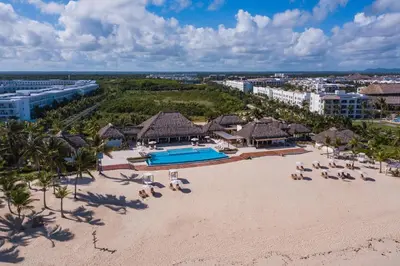 an aerial view of the beach at a resort at Cana Cove in Punta Cana