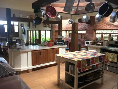a kitchen with a counter top in a kitchen at Villa del Pino en Quintas del Bosque in Jarabacoa