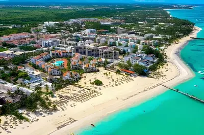 an aerial view of the resort and the beach at Condominio con piscina, cerca de la playa in Punta Cana