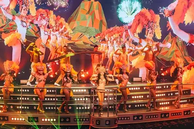 a group of performers on a stage at Condominio con piscina, cerca de la playa in Punta Cana