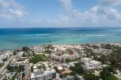 an aerial view of a city and the ocean at Alojamientos de 1 y 2 habitaciones a 5 min de la playa in Punta Cana