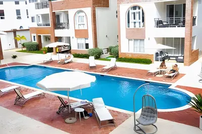 an image of a swimming pool at a hotel at Alojamientos de 1 y 2 habitaciones a 5 min de la playa in Punta Cana