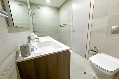 a bathroom with a sink and a toilet at Coral Village II in Punta Cana
