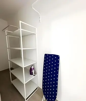 a shelf and a skateboard next to a wall at Coral Village II in Punta Cana