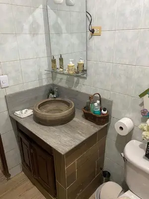 a bathroom with a sink and a toilet at Recidencial sharael house in San Isidro