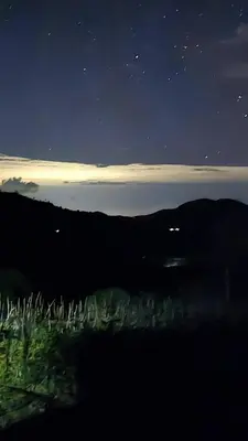 a night time view of a mountain with the stars at Nice mountain cabin, with the best view