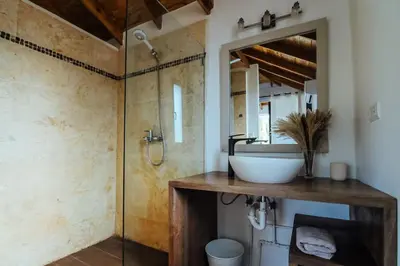a bathroom with a sink and a shower at Tropical Bliss Retreat in Las Terrenas