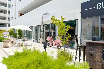 a pink scooter parked in front of a building at Gardenia B31 in Punta Cana