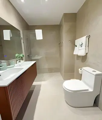 a bathroom with a toilet and a sink at Gardenia B31 in Punta Cana