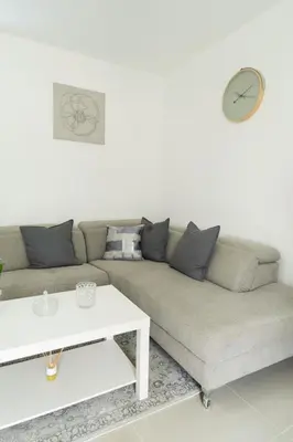 a living room with a couch and a table at SoliMar Caribeño in Boca Chica