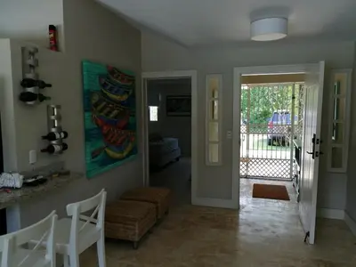 a living room with a couch and a table at Family Villa at Las Galeras, Samaná in Las Galeras