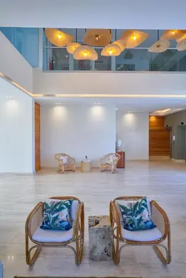 two chairs sitting in a large room with at Aquarella Caribbean Blue Summer Special GateAway in La Puntica de Juan Dolio