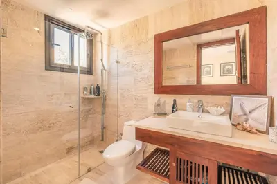 a bathroom with a toilet and a sink and a shower at Apartment with 2bedrooms in Portillo Residences in Las Terrenas