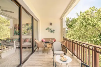 an indoor balcony with a table and chairs at Apartment with 2bedrooms in Portillo Residences in Las Terrenas