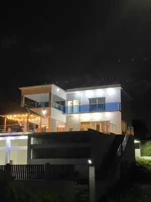 a large house at night with lights on it at Lujosa Villa in Río San Juan J in Río San Juan
