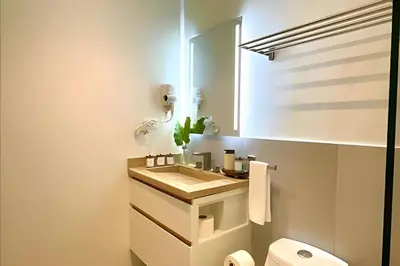a bathroom with a sink and a toilet at Costal View Apt. Walkable To Beach & Restaurants in Juan Dolio