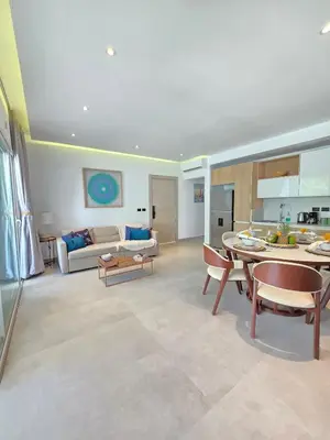a living room with a couch and a table at Margarita 102 Private Beach Access Aqua Esmeralda Dominicus in La Laguna