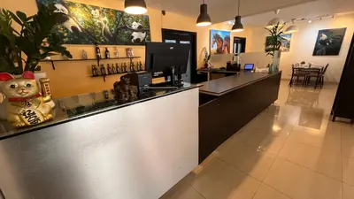 a bar in a restaurant with a counter top at Caonabo35 Elegancia Boutique en Santo Domingo 5 in Santo Domingo