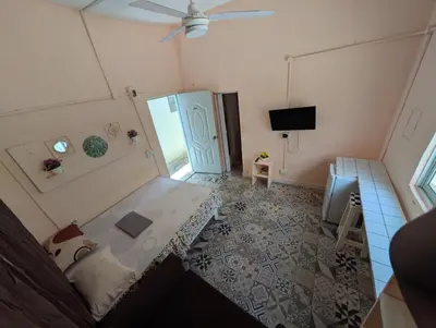 an aerial view of a room with a living room at Casa de huéspedes El Español in Santo Domingo