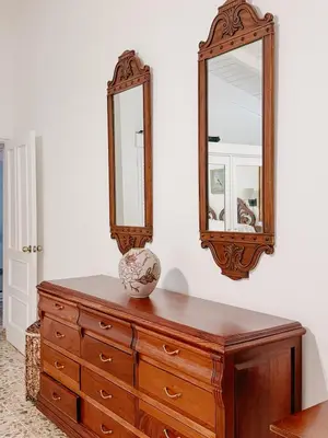 a dresser with a mirror on top of it at Lux Villa Casa de Campo in La Romana