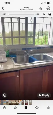 a kitchen counter with a sink and a window at Apartamento en Gribi in Juan Dolio