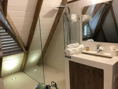 a bathroom with a shower and a sink at Beautiful Caribbean Villa Coson Beach in Las Terrenas