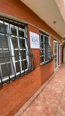 two windows on a brick building with a rtk sign at Sea Near and Beach a few minutes walking Top Location by RHV Living in San Felipe de Puerto Plata