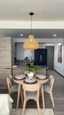 a dining room with a table and chairs in a kitchen at Modern, Comfortable, Close to Beaches in Colorado