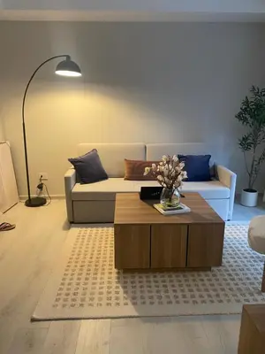 a living room with a couch and a coffee table at Playa Matilde, apartamento de lujo in Punta Cana