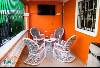a group of chairs and a table on a boat at Remanso de Paz in Pedernales