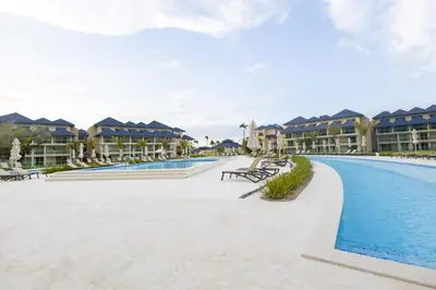 a view of the pool at the resort at View to paradise, One bedroom apartment in Puerto Plata