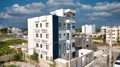 an image of a building in a city at Cozy Nest in La Romana