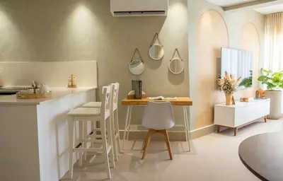 a kitchen with a counter and a table and chairs at Beach Pool Jacuzzi Wifi Netflix Gym 5 Guests in Villas del Mar