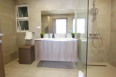 a bathroom with a sink and a shower at New Apartment! Beach getaway at Hard Rock in Punta Cana