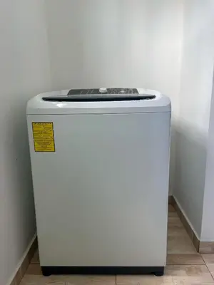 a white refrigerator sitting on the floor in a room at Ocean Vibes - Bayahibe in Bayahibe