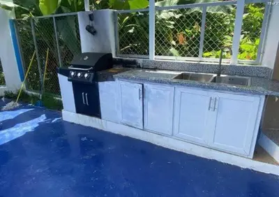 a kitchen with a sink and a counter top at Villa Machepa
