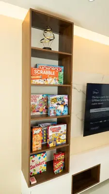 a book shelf filled with lots of snacks at Luxurious PH, Near Airport,Private Jacuzzi in Santiago de los Caballeros