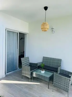 a living room with a couch and chairs and a table at Your ideal getaway awaits! in Punta Cana