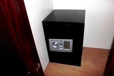 a black microwave oven in the corner of a room at Natural Pool Villa perfect for families in Río San Juan