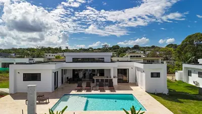an aerial view of a house with a swimming pool at Luxury Villa, Pool & Prime Location in Sosúa