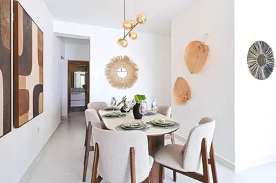a dining room with a table and chairs at Comfy 3BD Condo in Cocotal in Punta Cana