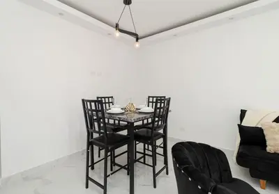 a dining room with a table and chairs at Cozy 1BR 1BA Bayahibe Getaway with Pool - Maravilla in San Rafael del Yuma
