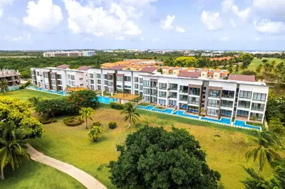 an aerial view of a resort with palm trees at Elegant Cocotal 2BD Condo in Punta Cana