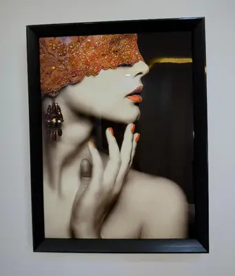 a picture of a woman wearing a headdress at Encanto Luxury Stay - Romana del Oeste in La Romana