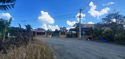 an empty street in a small town with at hotel las yayas la vega in Concepción de La Vega