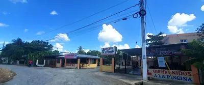 an empty street in a small town with buildings at hotel las yayas la vega in Concepción de La Vega