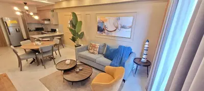 a living room with a couch and a table at Boca del Mar Tower III Apart 401 in Boca Chica