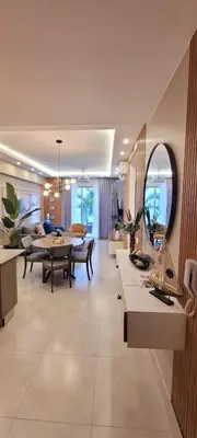 a living room with tables and a dining room at Boca del Mar Tower III Apart 401 in Boca Chica