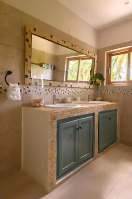 a bathroom with a sink and a mirror at New! Gorgeous Portillo Beach Villa W Pool & Staff in Abra Grande