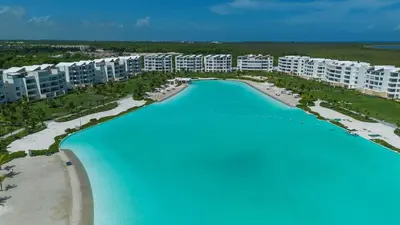 an aerial view of a resort on the beach at PB 3 hab | con piscina privada + laguna cristalina in Punta Cana